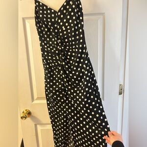 Black Polka Dot Midi Slip Dress with adjustable straps.